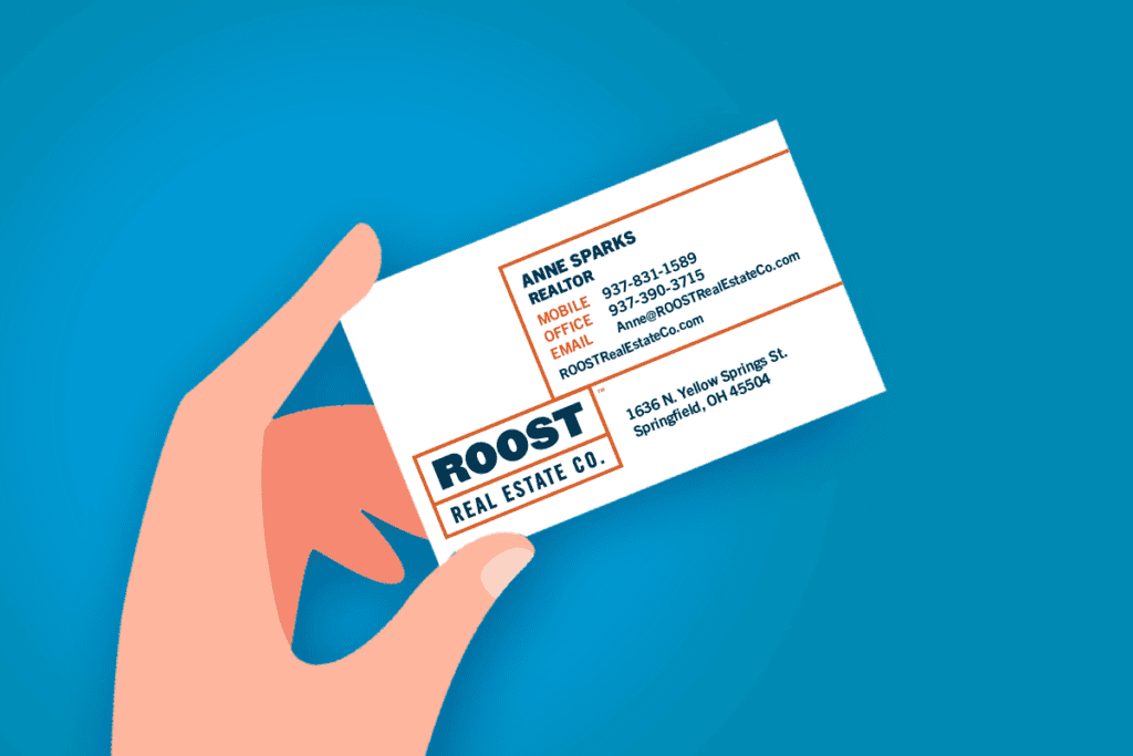 A hand holding a ROOST Real Estate Co. Realtor business card, on why agents need to build their brand